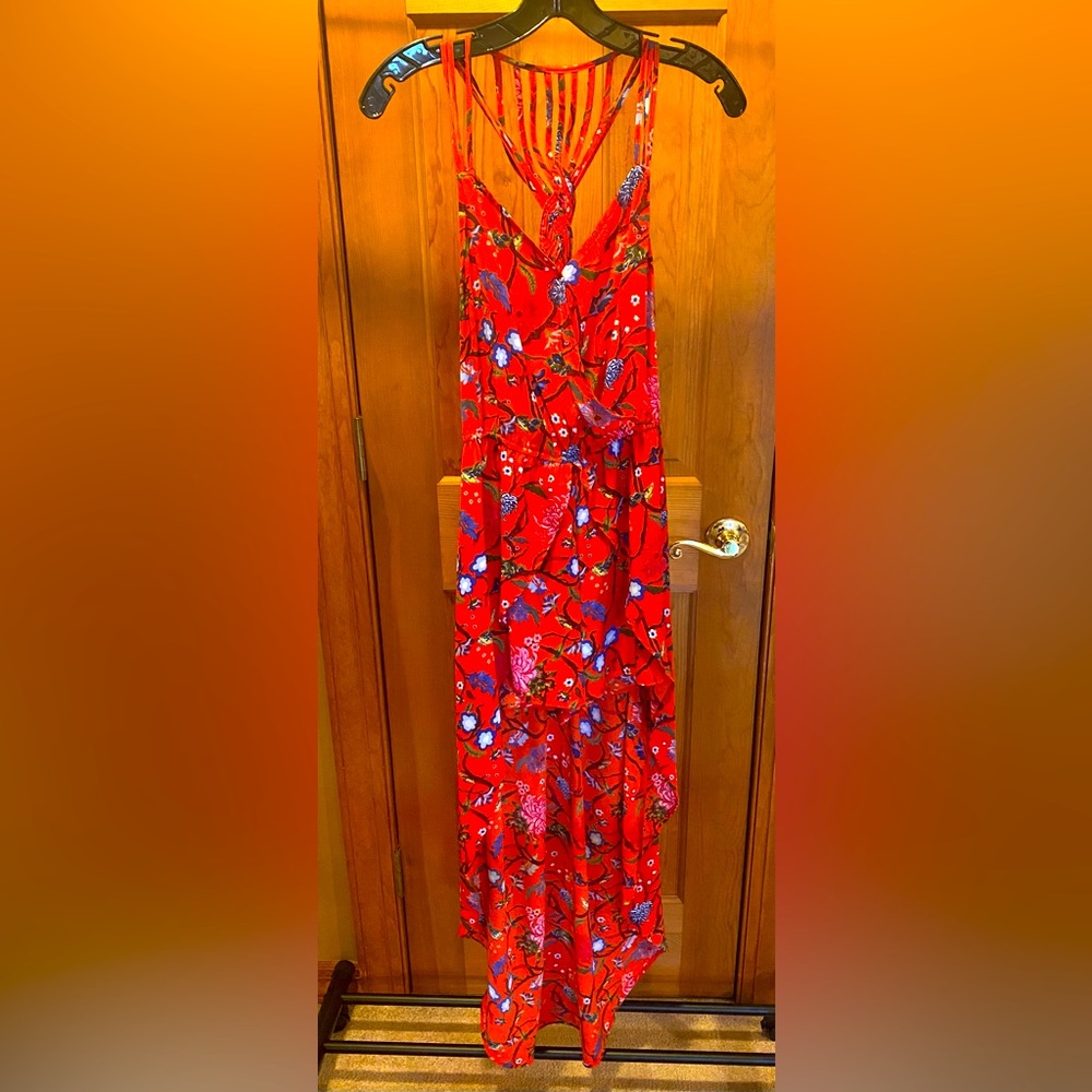 Red floral romper with long train in back